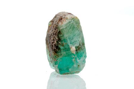 macro mineral stone emerald on a white background close-upの写真素材