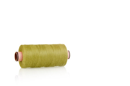 skein of thread green colors macro on a white background close-up