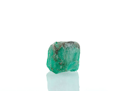 macro mineral stone emerald on a white background close-upの写真素材