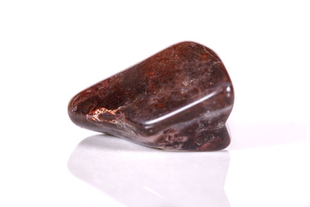 Macro mineral stone jasper on a white background close up