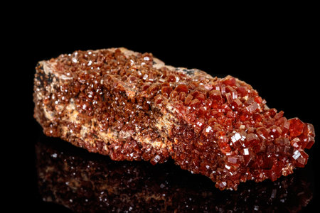 Macro mineral stone Vanadinite on a black background close upの写真素材