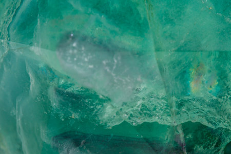 Macro mineral stone Fluorite crystal on a black background close-upの写真素材