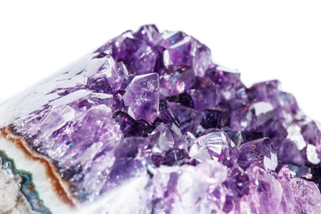 Amethyst Crystal Druse macro mineral on white background close up