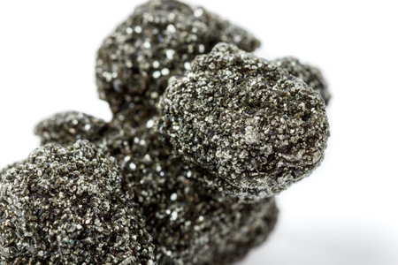 Macro mineral stone chlorite in quartz on a white background close up
