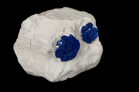 Macro mineral stone Azurite in siltstone against black background close upの写真素材