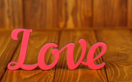 wooden inscription I love you on a wooden background close-upの写真素材