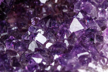 Macro Mineral Stone Amethysts in the rock on a white background close upの写真素材