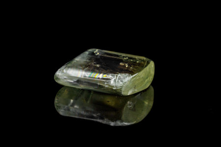 Macro mineral stone Gedanite black background close up