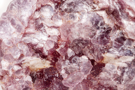 Macro mineral stone Lepidolite in the rock a white background close upの写真素材