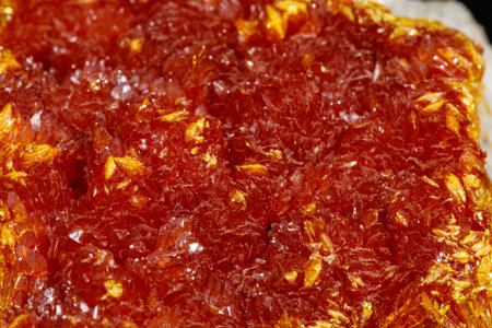 Macro Mineral Stone Orpiment on Black Background Close Upの写真素材