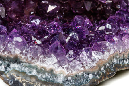 Macro Mineral Stone Amethysts in the rock on a white background close upの写真素材