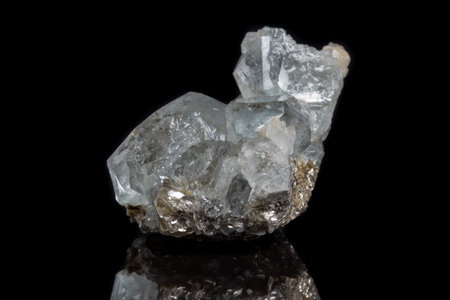 Macro mineral stone Aquamarine on a black background close up
