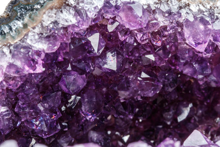 Macro Mineral Stone Amethysts in the rock on a white background close upの写真素材