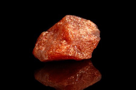 Macro mineral stone Nepheline sunny stone black background close upの写真素材