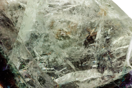 Macro of a mineral stone Fluorite on a white background close upの写真素材