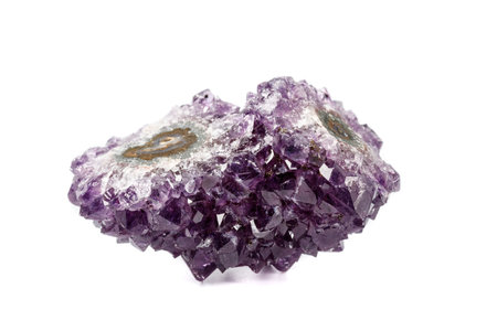 Macro mineral stone Amethysts eye crystals on white background close upの写真素材