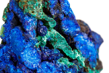 Macro mineral stone malachite with azurite on white background close up