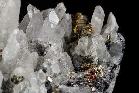Macro mineral stone Galena, Sphalerite, Pyrite, Quartz on a black background close-up