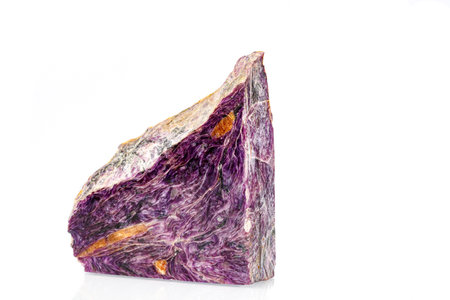macro stone mineral charoite on a white background close-upの写真素材
