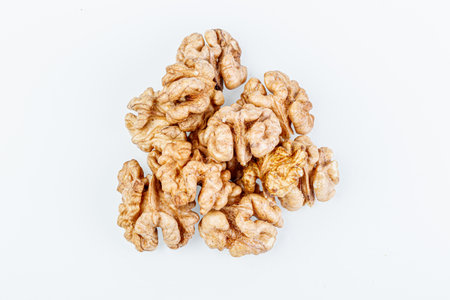 macro juglandaceae nuts, walnut on a white background close-upの写真素材