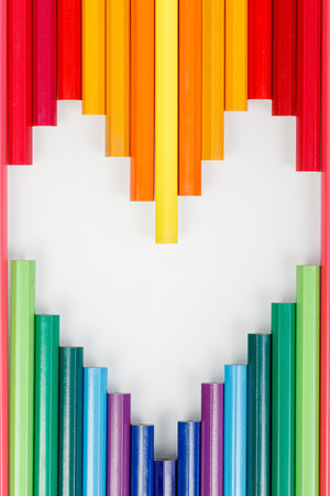 Multicolored pencils in the form of a heart close-upの写真素材