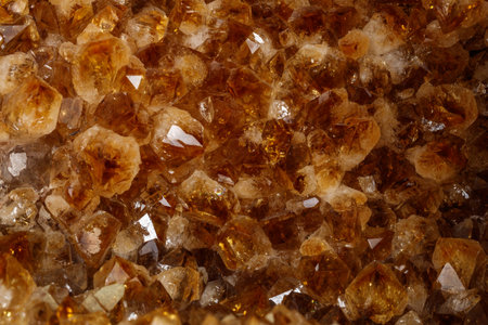 Macro mineral stone Citrine on a black background close upの写真素材
