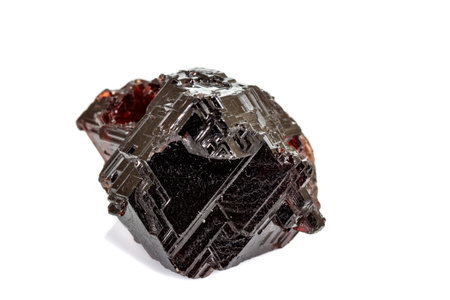 Macro stone Garnet mineral in rock on a white background close upの写真素材