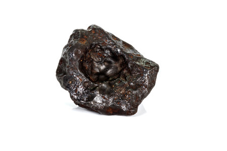 Macro stone mineral meteorite tektite on white background close upの写真素材