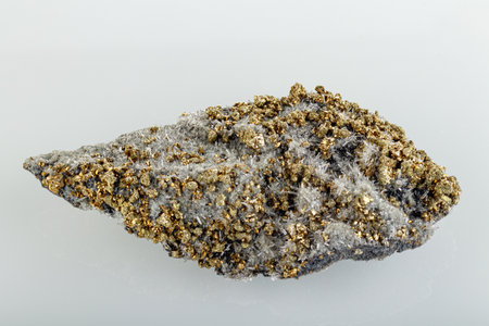 macro stone mineral Quartz pyrite on a white background close-up