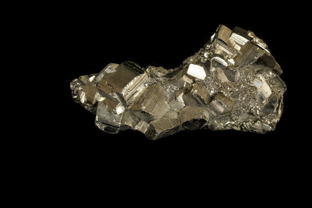 Macro mineral stone Pyrite on a black background close up