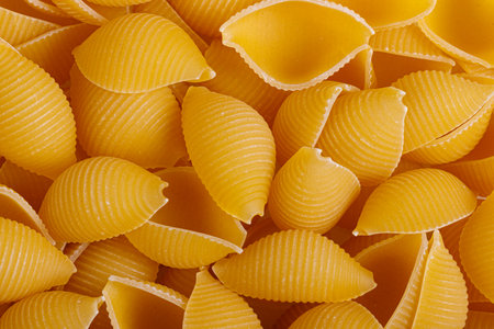 Pasta products in the form of a shell, texture, close-up