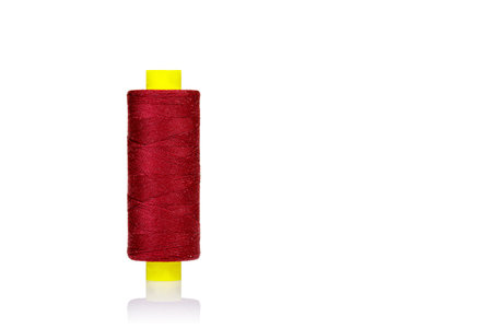 skein of thread red colors macro on a white background close-up