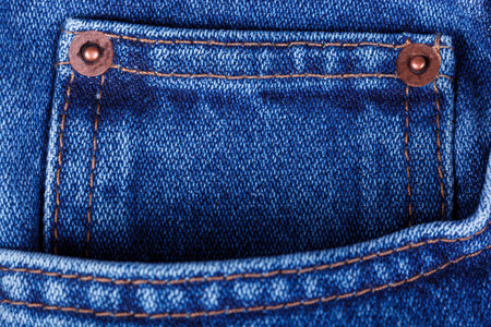blue color jeans texture on white background close up