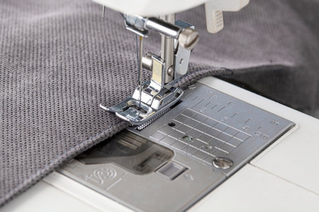 Sewing machine, stitching fabrics, needle in a round plan close upの写真素材