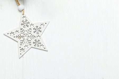 christmas toys star on wooden background close upの写真素材