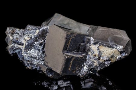 Macro stone mineral Galena on a black background close-up
