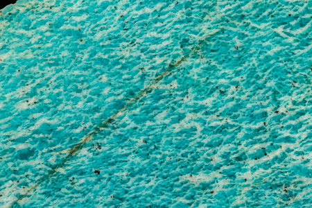 Macro of mineral stone amazonite on a black background close upの写真素材