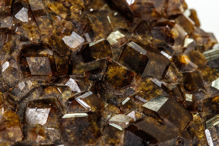 Macro stone Grossular mineral in rock on a white background close upの写真素材