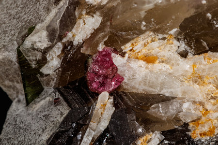 Macro mineral quartz mineral Tourmaline on Lepidolite black background close upの写真素材