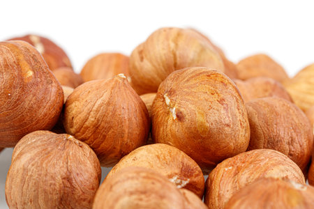 macro hazelnuts nuts on a white background close-upの写真素材