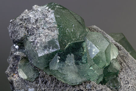 macro mineral stone green fluorite on a black background close-upの写真素材