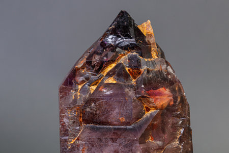 macro mineral stone amethyst with smoky quartz on a black background close-upの写真素材