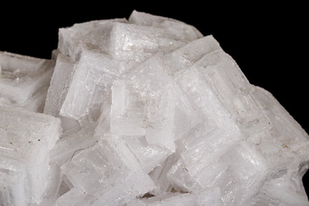 macro mineral fluorite stone on black background close up