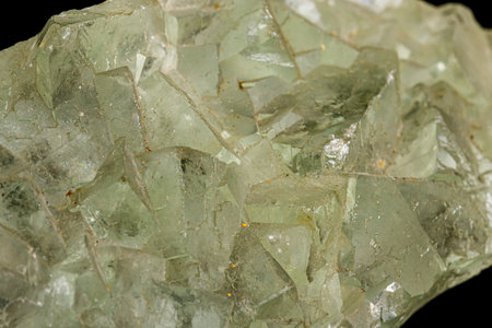 Macro stone mineral Fluorite on a black background close up