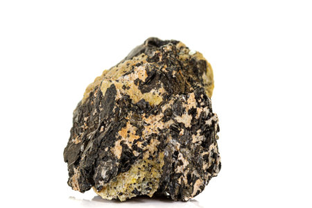Macro of a mineral stone Vesuvianite on a white background close up