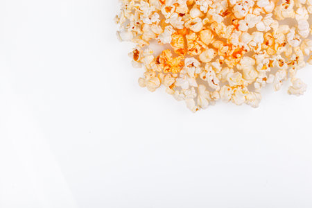 scattered popcorn on a white background close-upの写真素材