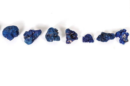 Macro mineral stone Malachite and Azurite against white background, close up