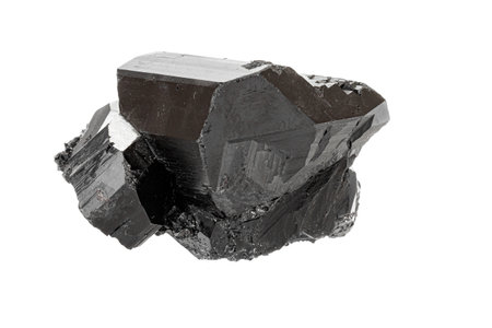 Macro stone black mineral tourmaline Scherl on white background close up