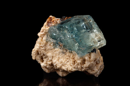 macro mineral stone aquamarine on a black background close up