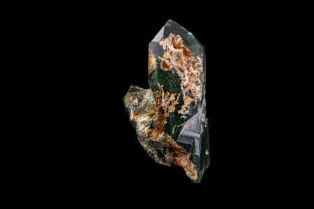 macro Axinite mineral stone on a black background close up